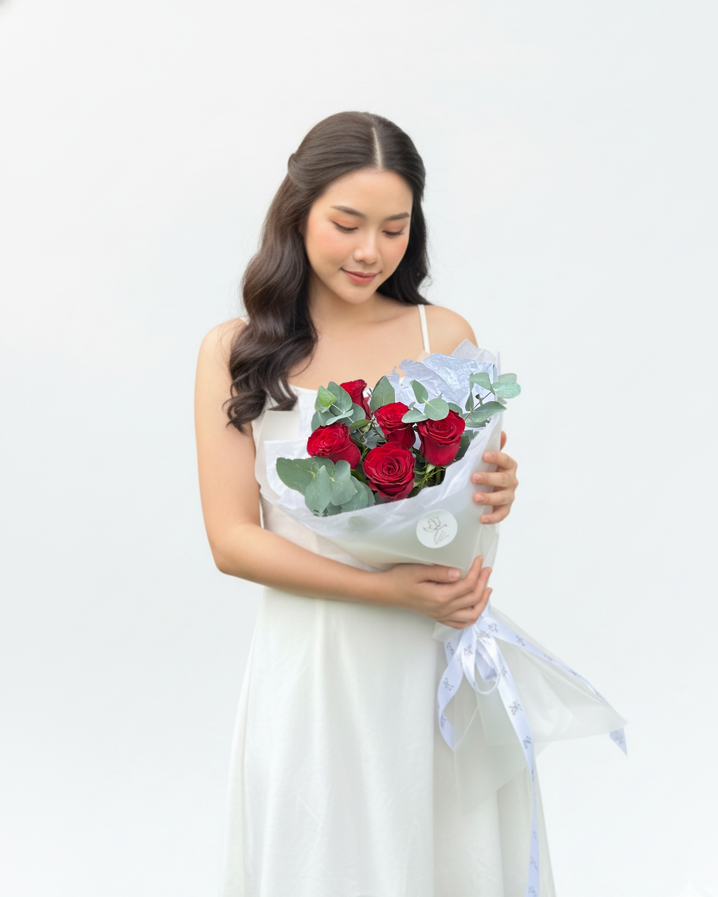 5 red rose with eucaliptus
