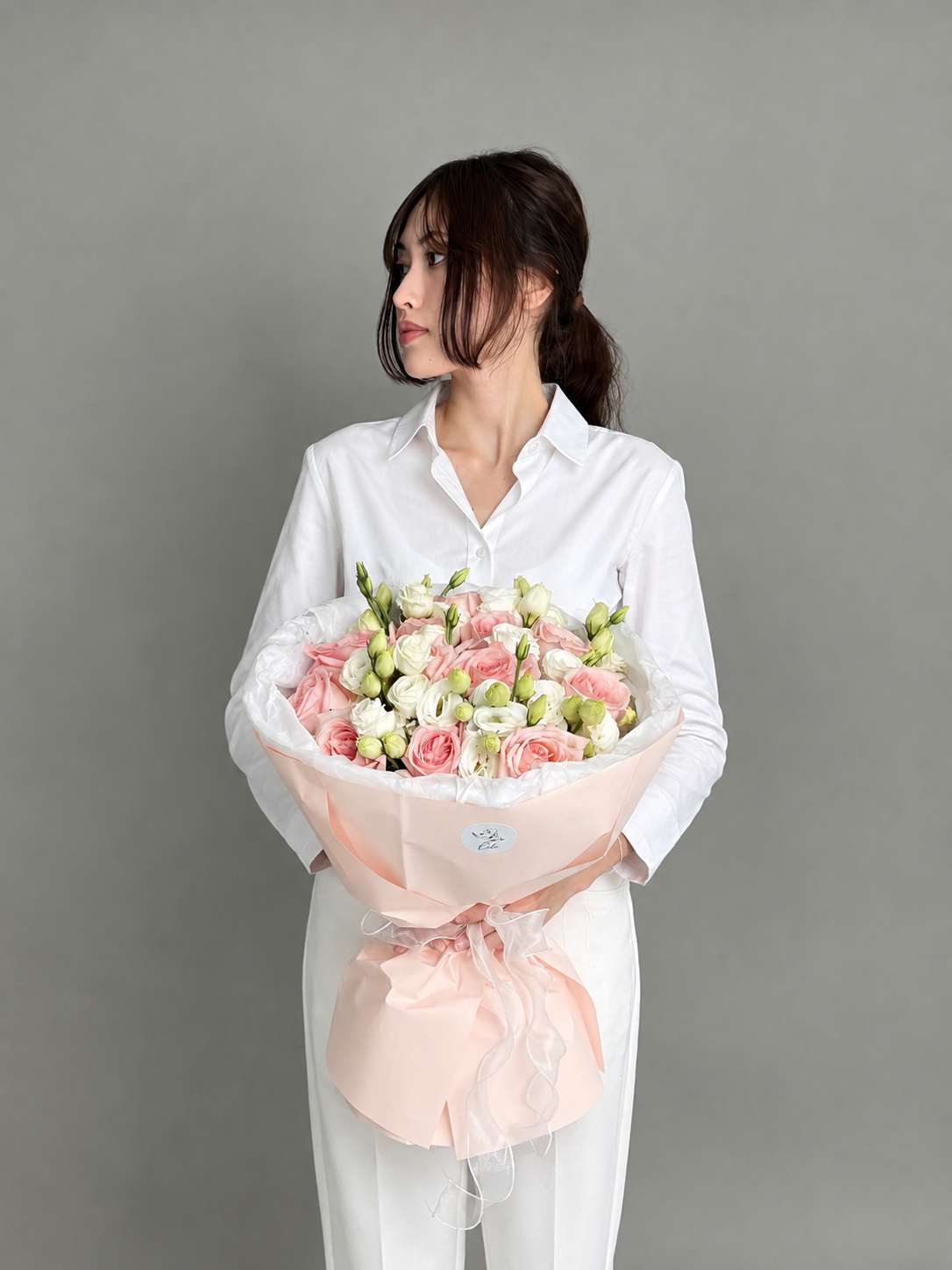 A bouquet of eustoma and peony roses Ohara