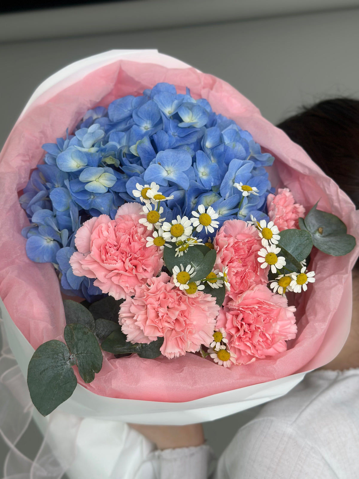 Mix bouquet with blue hydrangeas