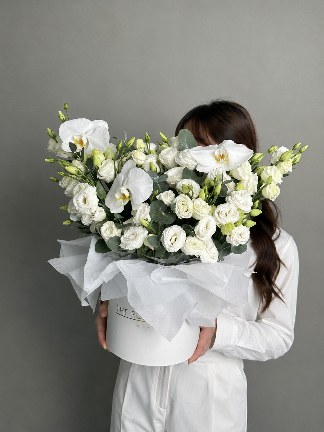 Box with Eustoma and orchid white