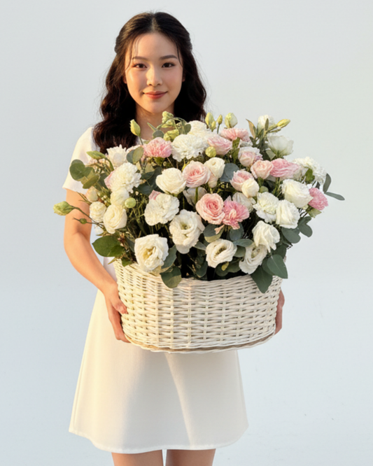 Basket with eustoma and dianthus