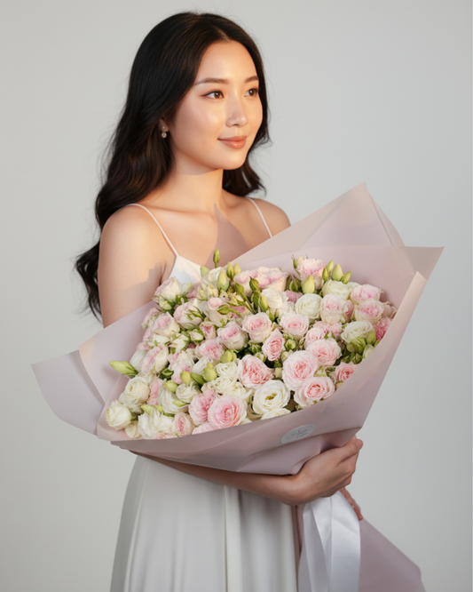 Eustomas and spray roses