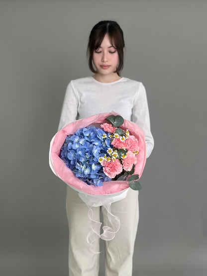 Mix bouquet with blue hydrangeas