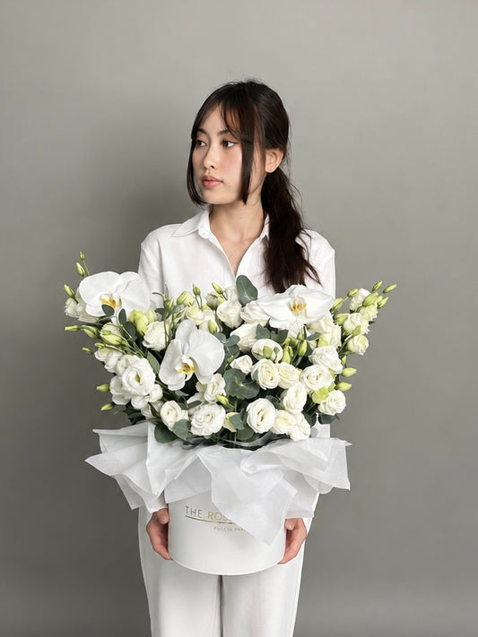 Box with Eustoma and orchid white