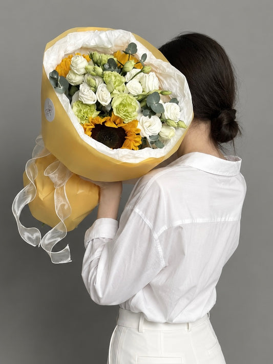 Bouquet with sunflowers and carnations