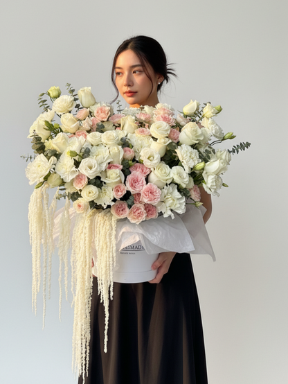 Author's composition with roses, dianthus and eustoma
