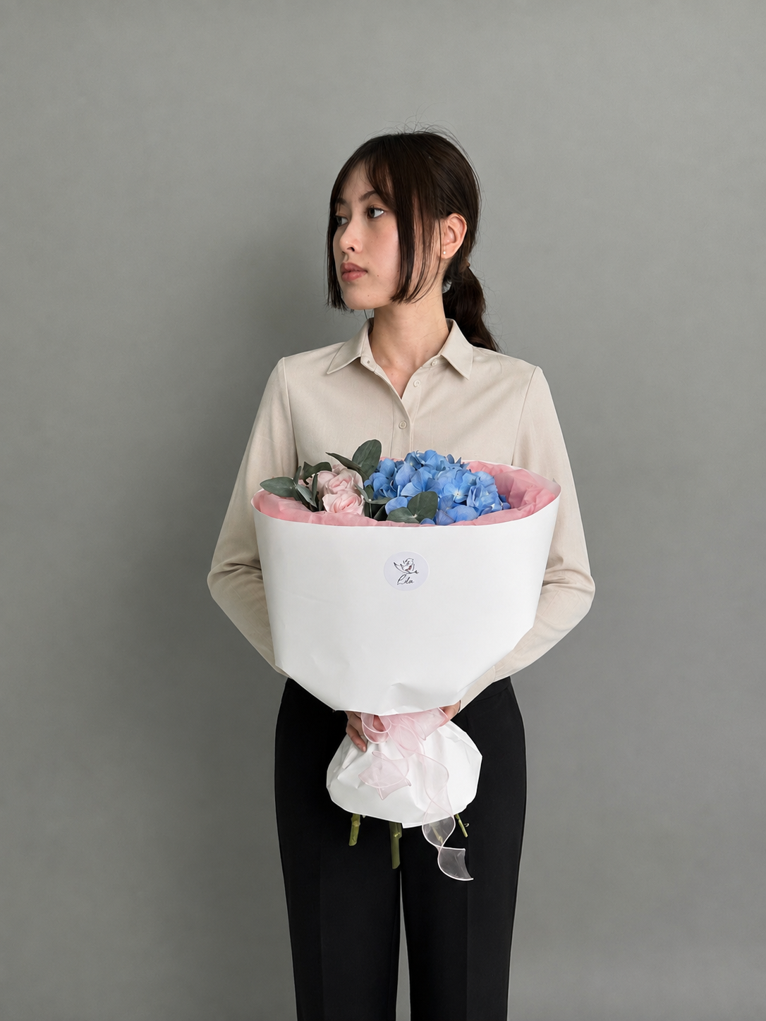 Blue hydrangea with O'Hara rose