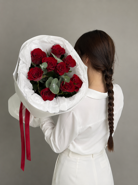 9 red roses with eucalyptus