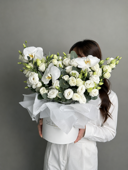Box with Eustoma and orchid white