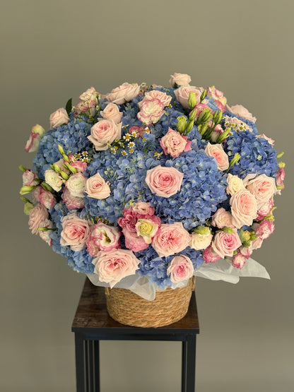 Large cashpo with a mix of flowers