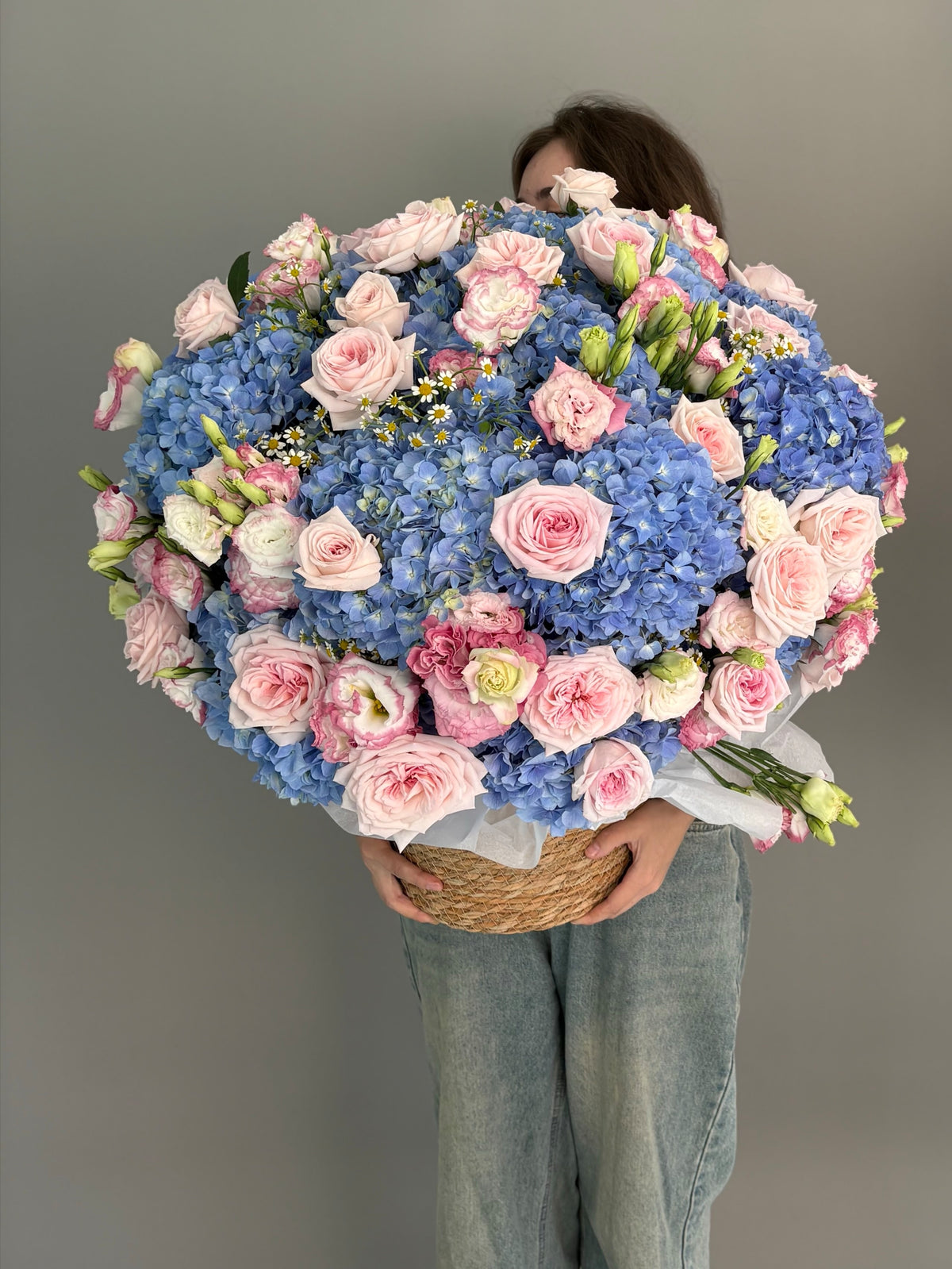 Large cashpo with a mix of flowers