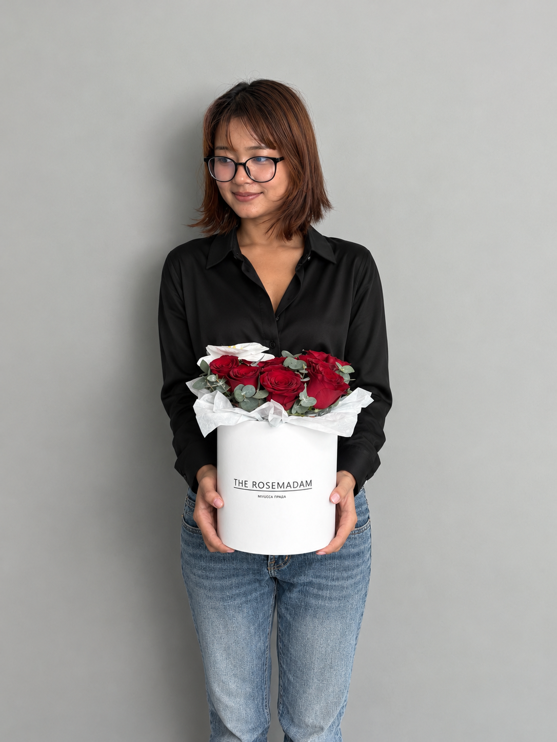 Box with 15 red rose and orchid