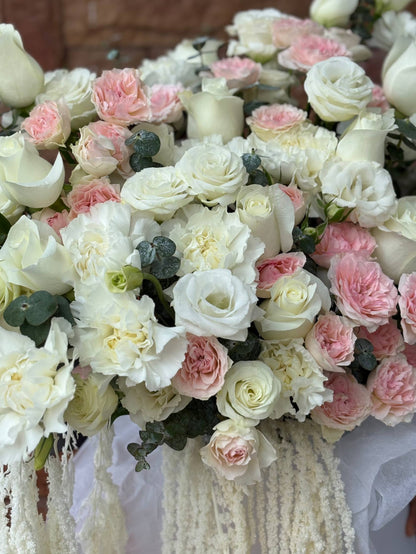 Author's composition with roses, dianthus and eustoma