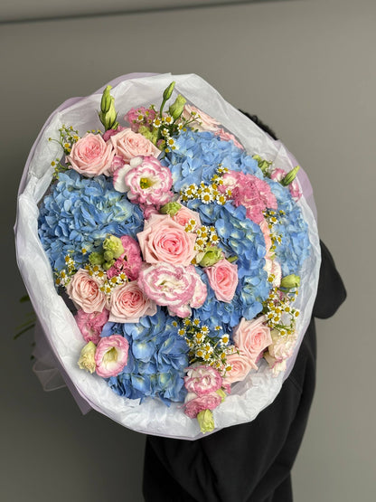 A bouquet with hydrangeas, peony roses, and eustoma. Size L