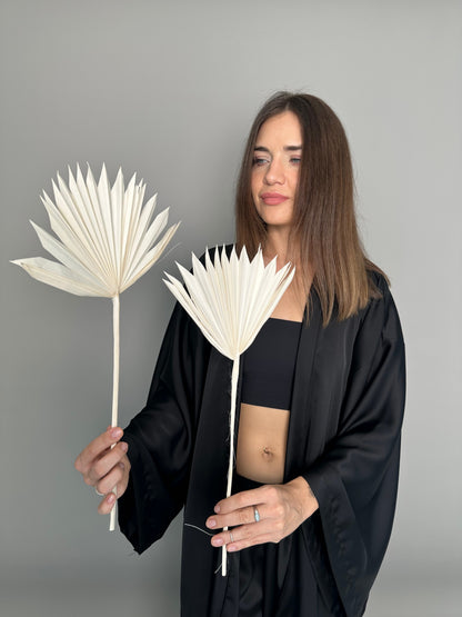 Palm leaves. White.